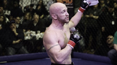 Pastor Paul Burress testifies to a crowd before his MMA flight