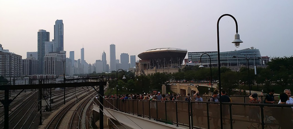 Fans without tickets strain to hear the Grateful Dead’s final performance outside Soldier Field in Chicago on July 5, 2015. Photo by author.