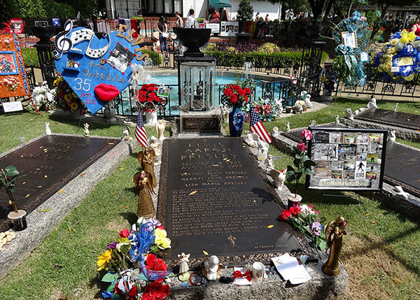 Elvis' grave at Graceland. Photo by Nick Shields, August 26, 2012. Available via Flickr.